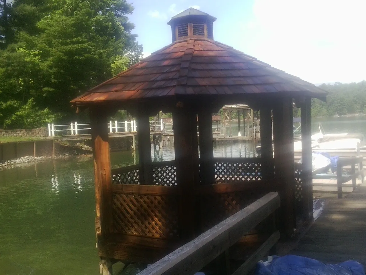 Cedar shake gazebo roof rebuilt on a lake dock in Parlin